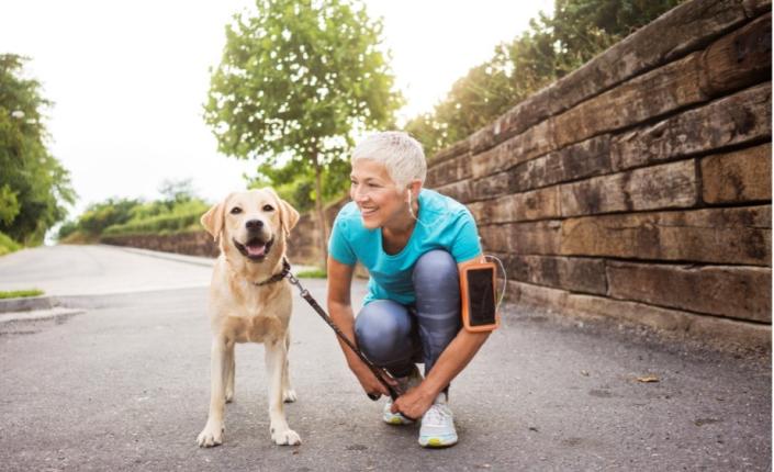 Woman exercising with dog